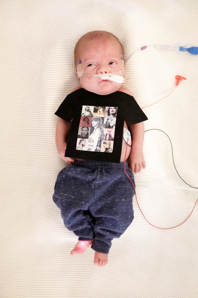 One baby wore a tour merch T-shirt.