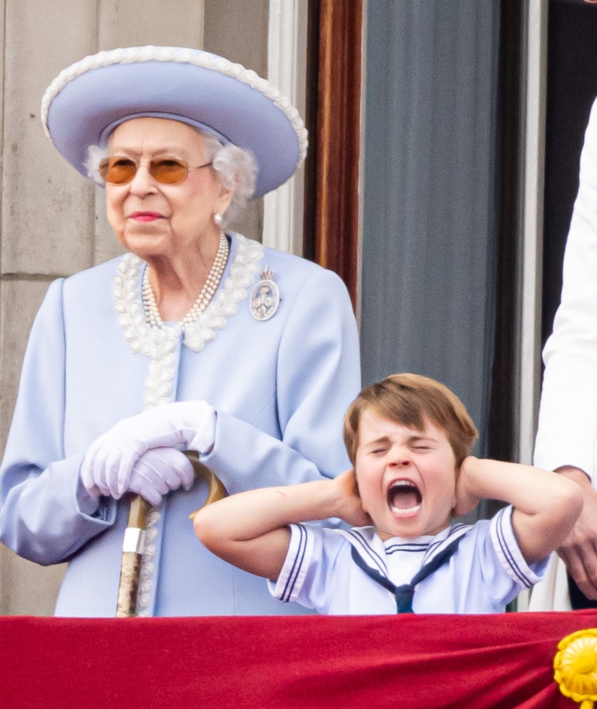 During a flyover, Prince Louis standing on the balcony next to his late Great-Grandmother, he holds his hands over his ears and screams.