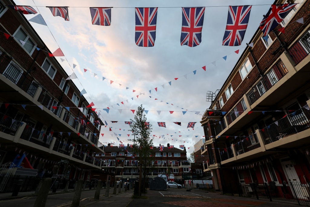 Flags adorn the Kirby Estate in Bermondsey, South London, in preparation for the Britain's King Charles and Camilla, Queen Consort's coronation, in London on May 5.