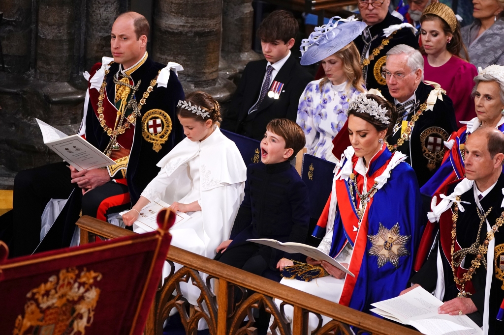 Louis gives a yawn during the coronation mass and liturgy on May 6 as he stands next to his parents and his sister.