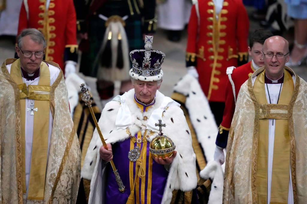 itain's King Charles III, center, walks in the Coronation Procession after his coronation ceremony at Westminster Abbey in London Saturday, May 6, 2023