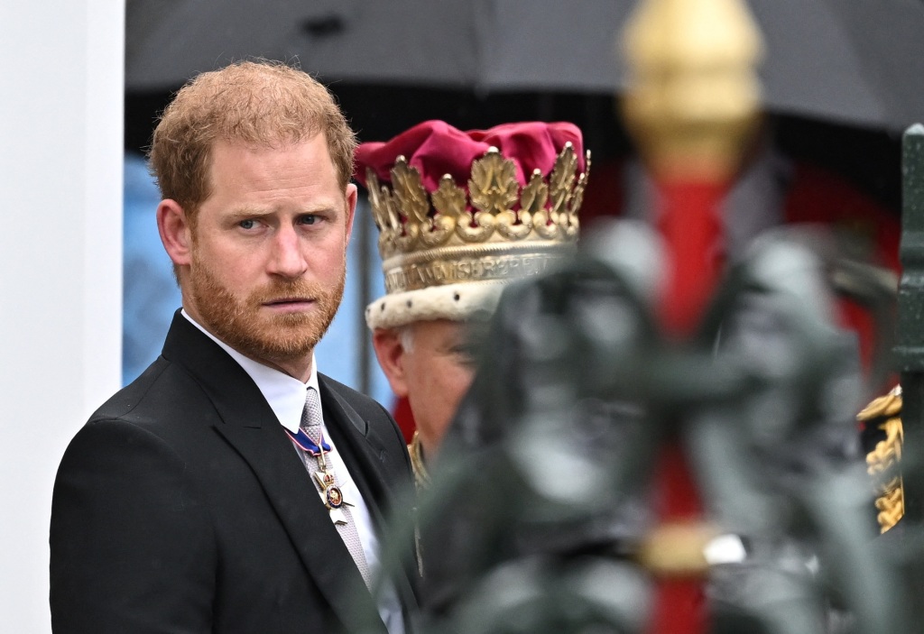 Britain's Prince Harry stands outside Westminster Abbey following Britain's King Charles' coronation ceremony, in London, Britain May 6, 2023. REUTERS/Dylan Martinez
