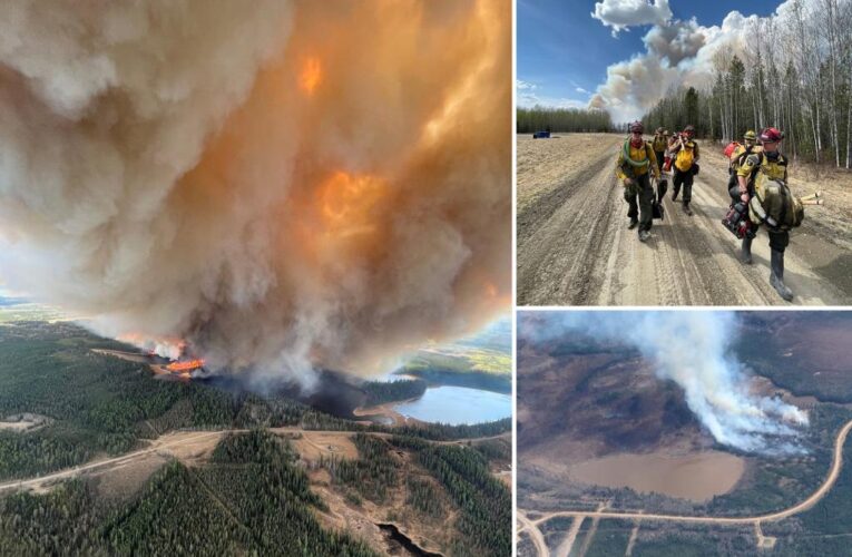 Over 24,000 people evacuated from Alberta as wildfires rage