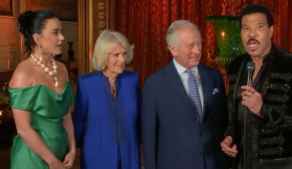 Perry (left) and Richie (right) managed to shoot across the sky and check in with the ongoing competition through a live stream and were joined by King Charles III and Queen Camilla (center) who made a "surprise" appearance.   