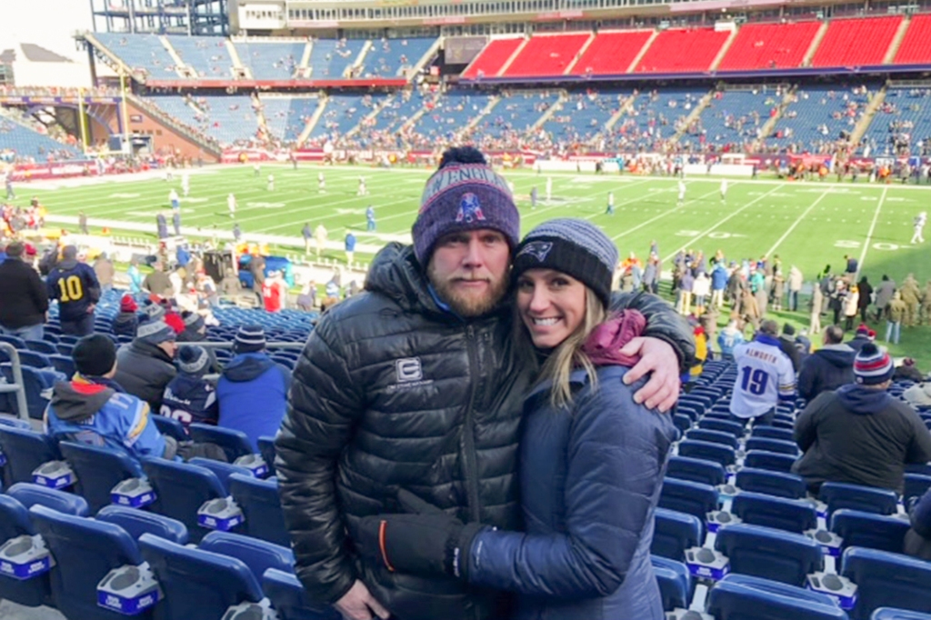 Eric and Kouri Richins at a football game