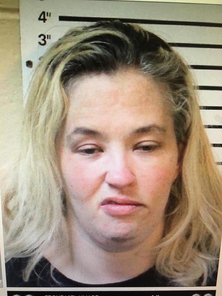 Mama June is seen sneering in her mugshot following her crack cocaine arrest in March 2019.