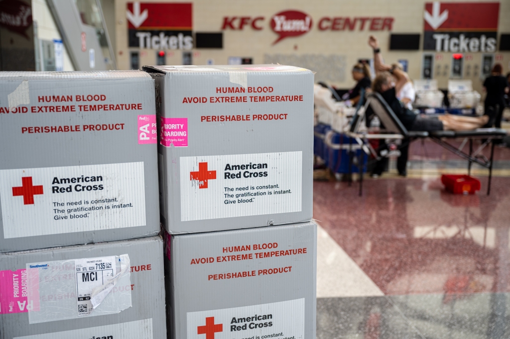 Boxes with the American Red Cross labels on them.