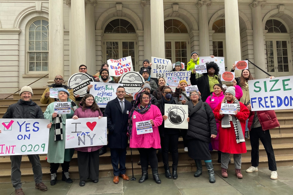 Supporters of the bill with signs.