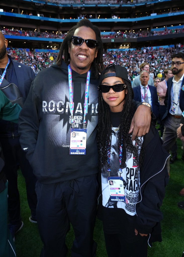 Jay-Z and Blue Ivy Carter attend Super Bowl LVII at State Farm Stadium on Feb. 12 in Glendale, Arizona. 