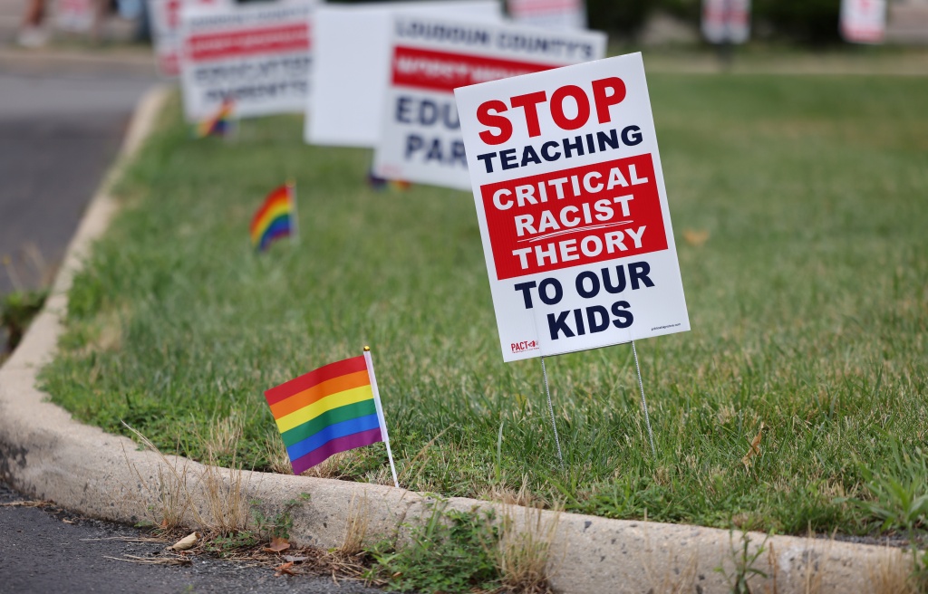 Signs against CRT on a Loudon front lawn.