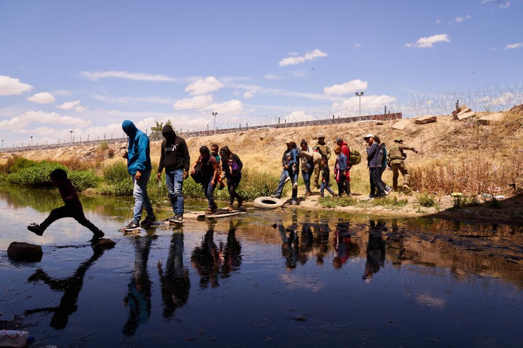 Migrants at the Rio Grande River