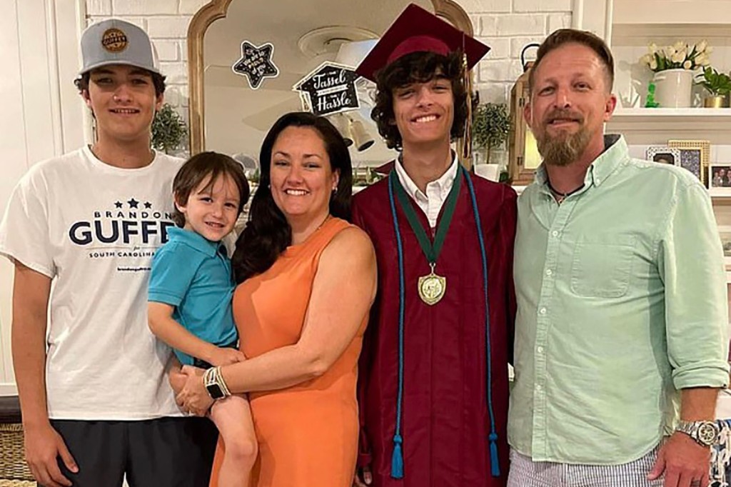 Gavin on his graduation day with family.