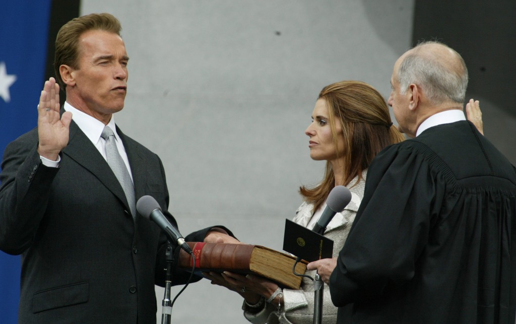 Arnold Schwarzenegger with Maria Shriver being sworn in as California governor in 2003.