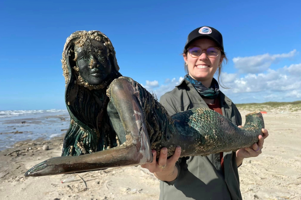 The bizarre discoveries — including this fiberglass mermaid — were uncovered during researchers' weekly surveys of the beach.