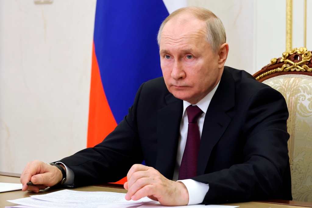 Russian President Vladimir Putin chairs a cabinet meeting via videoconference at Kremlin in Moscow, Russia, Wednesday, May 17, 2023.