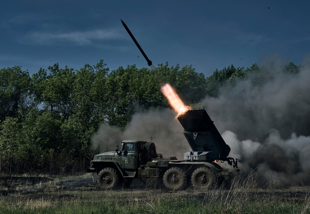 A Ukrainian army Grad multiple rocket launcher, fires rockets at Russian positions in the frontline near Bakhmut, Donetsk region, Ukraine, Wednesday, May 17.