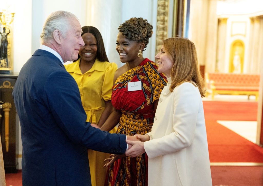 King Charles III speaks with Geri Horner and Oti Mabuse as he hosted the winners of the Prince's Trust Awards at Buckingham Palace.