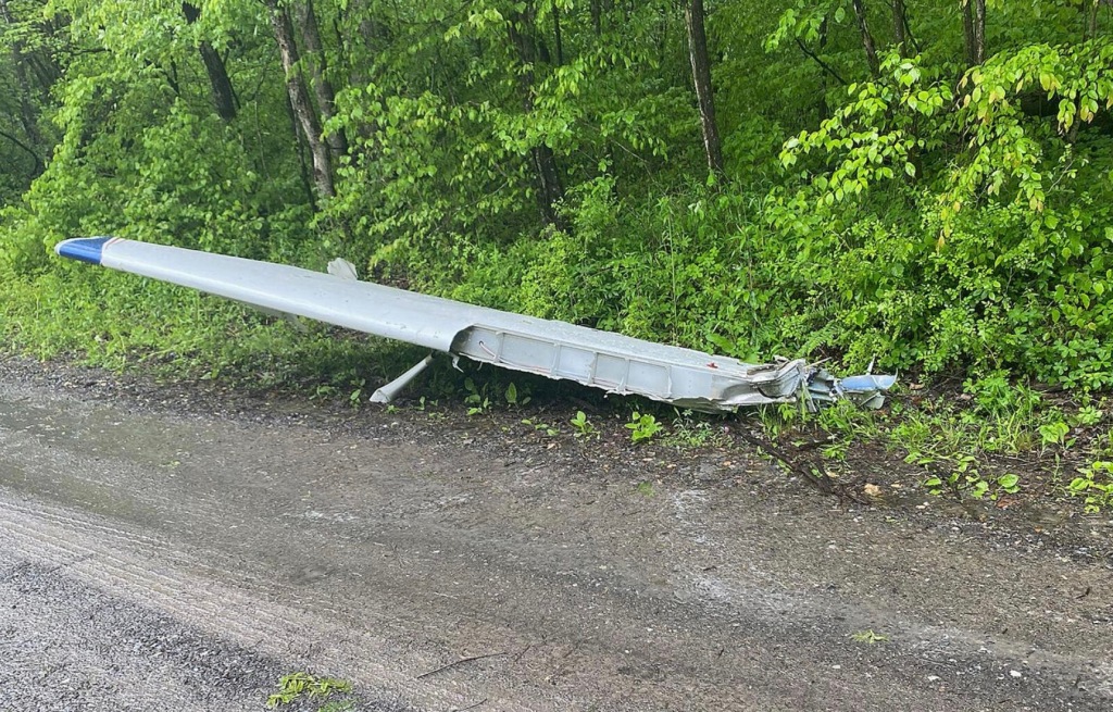 The wing on the side of the road.