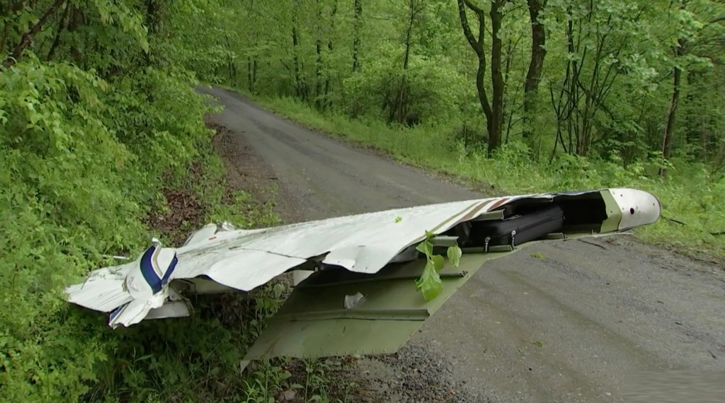 The wing on the side of the road.