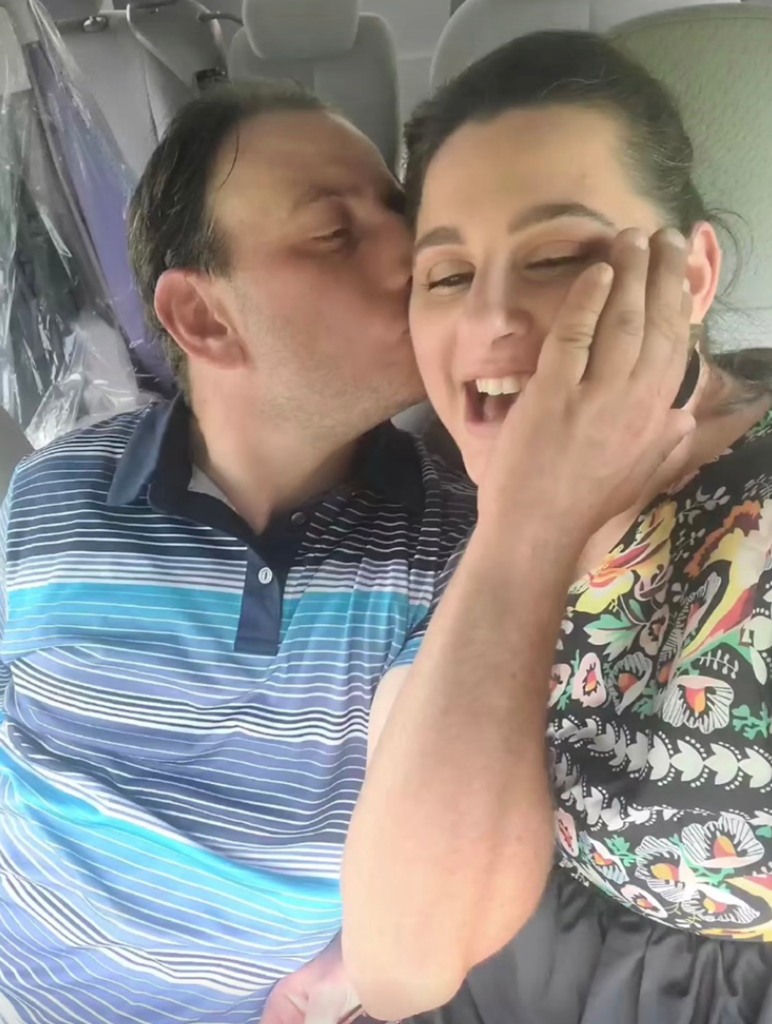 Victim Hershy Schwartz kissing his fiancee Rosie Brustowsky