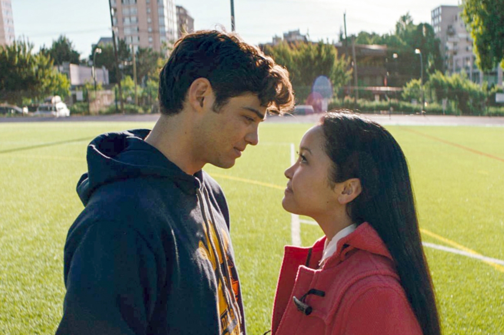 Noah Centineo looking at Lana Condor. 