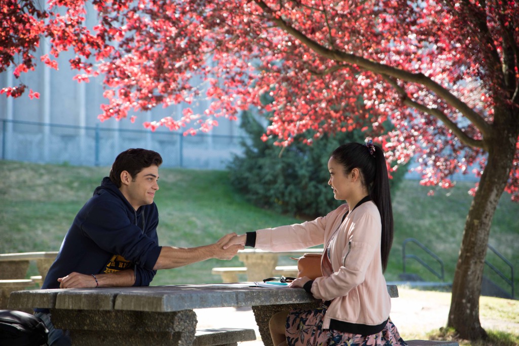 Peter Kavinsky (Noah Centineo) and Lara Jean (Lana Condor) in "To All the Boys I've Loved Before" smile at each other. 