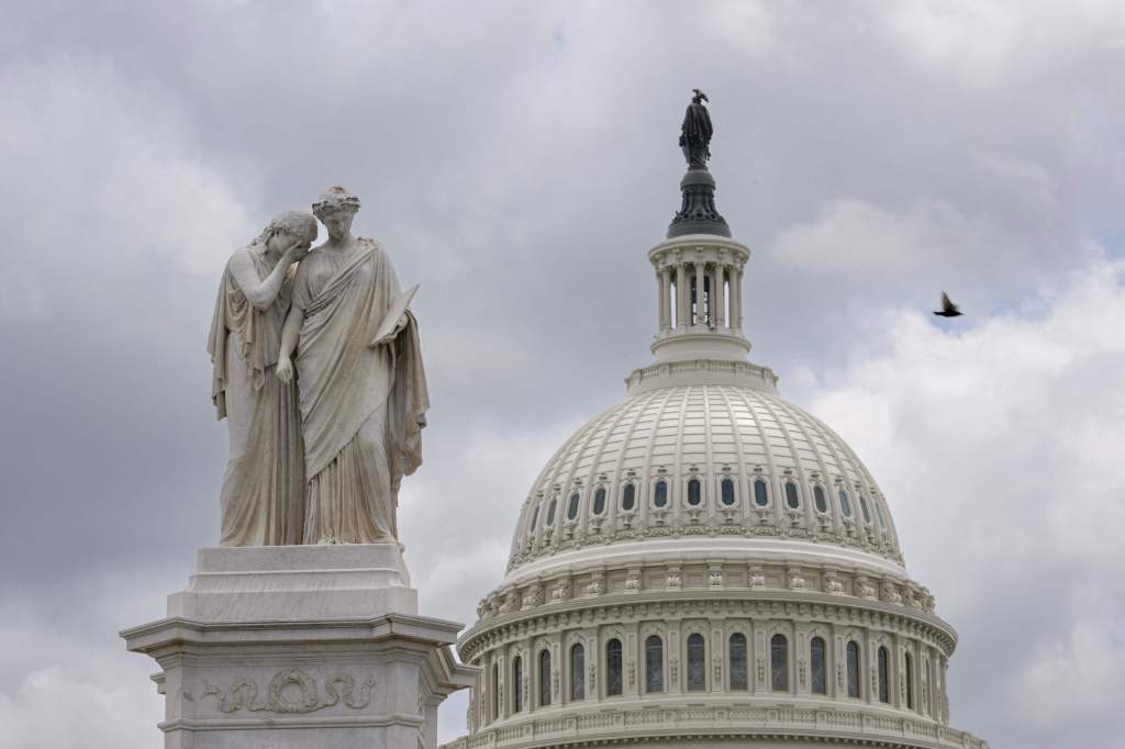 The Peace Monument with a figure of Grief weeping on the shoulder of History is seen in front of the US Capitol in Washington, DC, on May 19, 2023. 