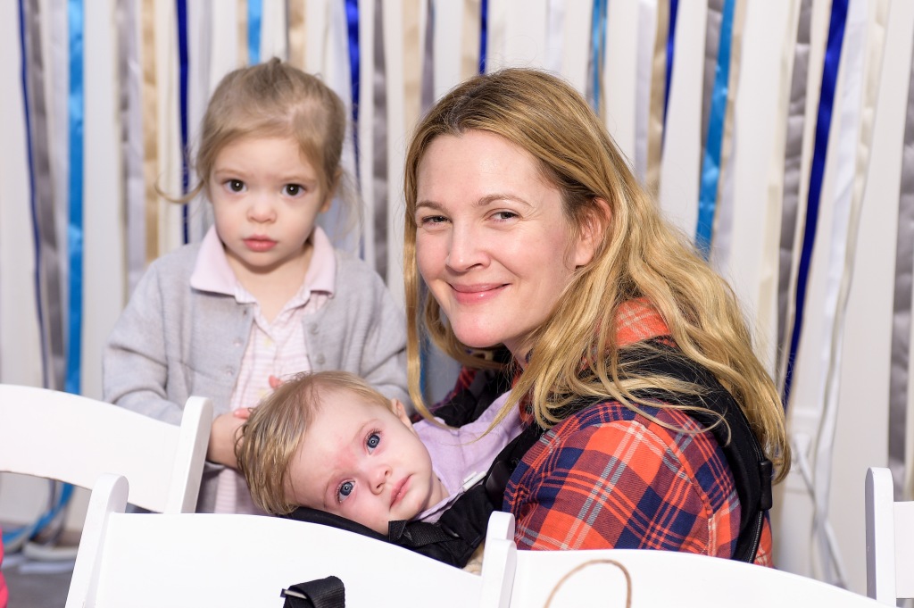 Drew Barrymore is shown with her children, Olive Barrymore Kopelman and Frankie Barrymore Kopelman, in 2014.