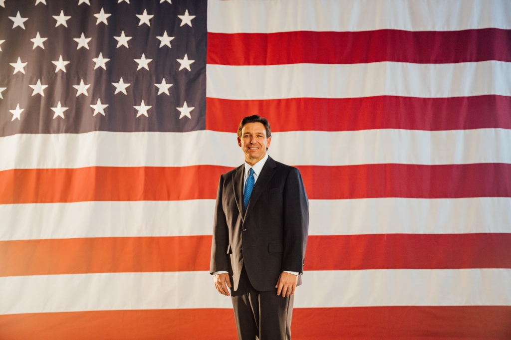 Gov. Ron DeSantis standing in front of a huge US flag while launching his presidential campaign.