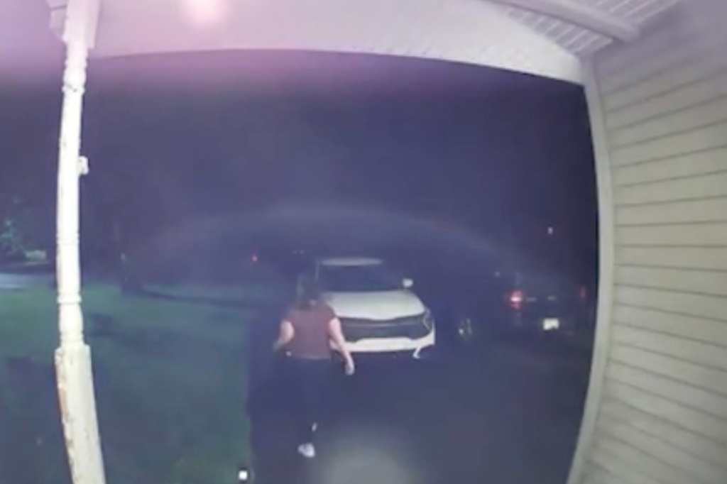 Surveillance footage shows Dana Smithers leaving a house and walking towards a car at night. 