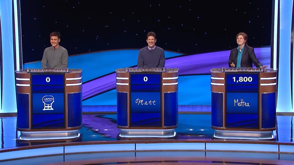 "Jeopardy! Masters" contestants Mattea Roach (right), James Holzhauer (left) and Matt Amodio (center) laugh at Ken Jennings. 