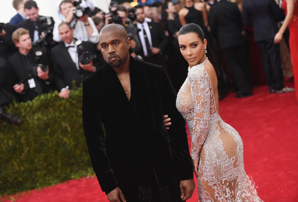 Kanye West and Kim Kardashian in 2015, dressed up on the red carpet. 