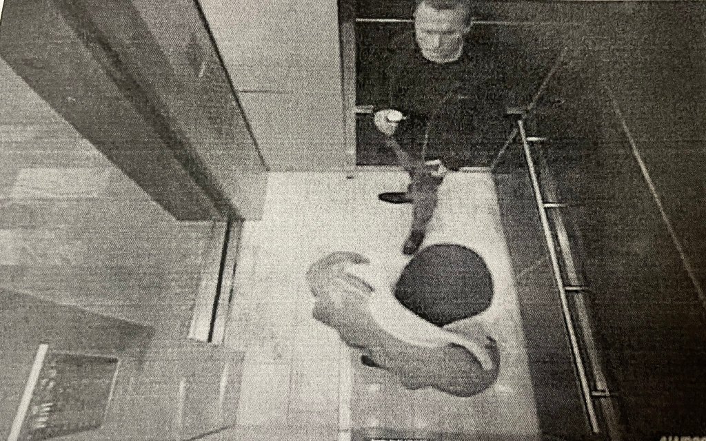 surveillance shows Lee and Momeni together  in an elevator.