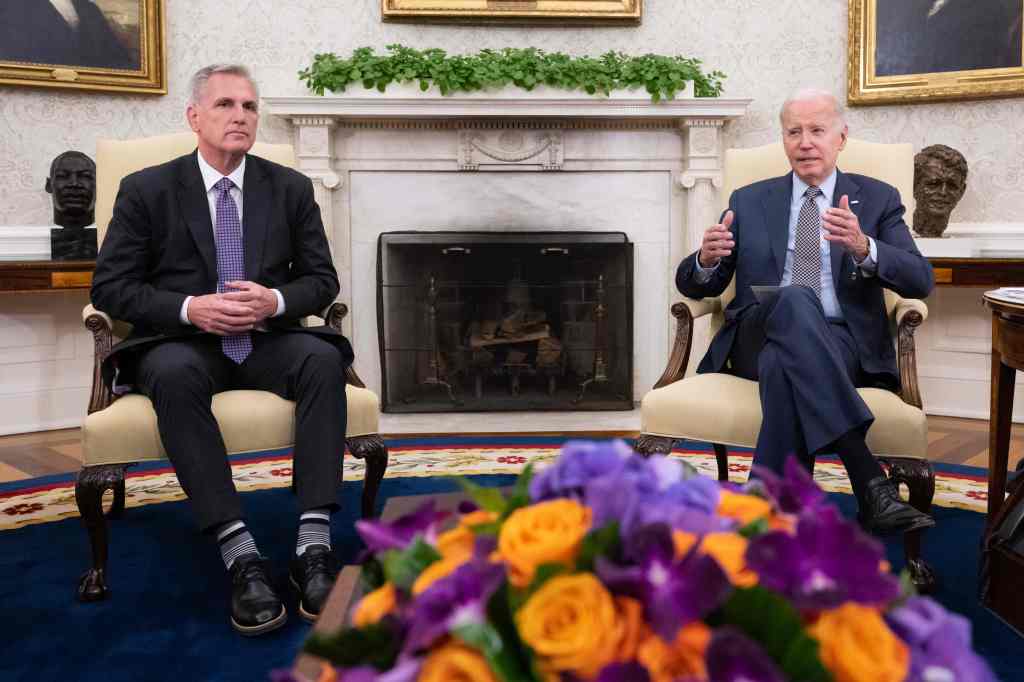 pictured are McCarthy and President Biden 