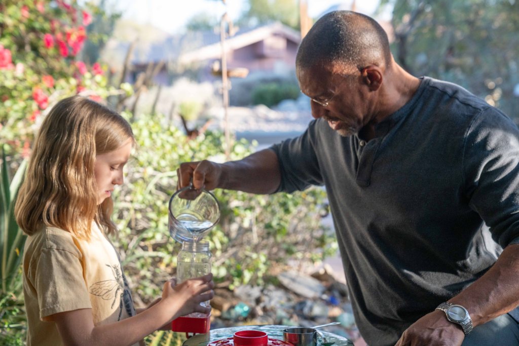 Host Christian Cooper is pictured teaching how to make sugar water for the Costa Hummingbirds.  