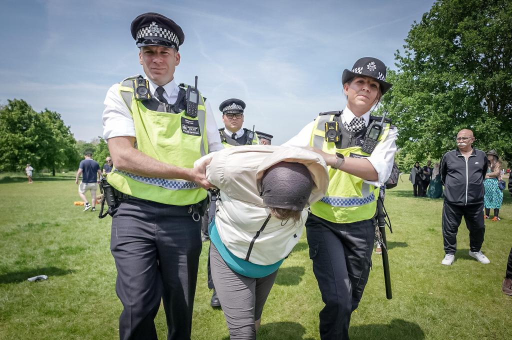 Police arresting someone at Sunday's event.