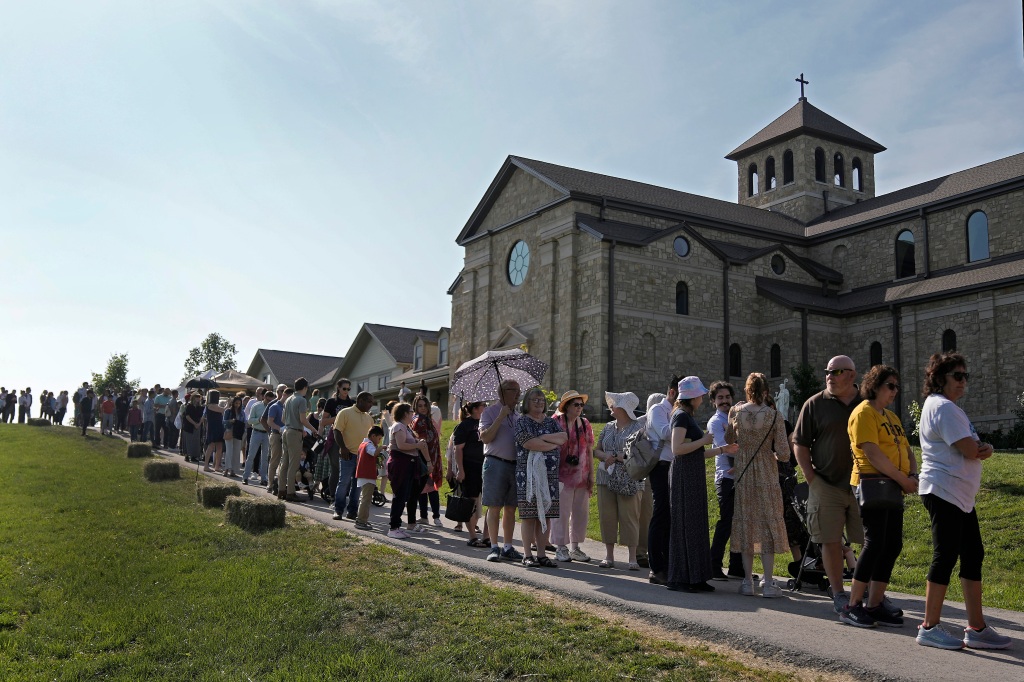 The exhumed body of the "miracle" nun has drawn thousands of visitors.