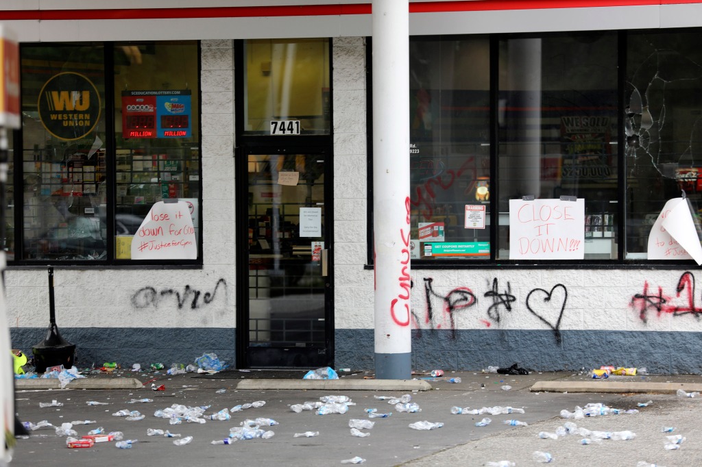 Debris is spread out in front of a convenience store, Tuesday, May 30, 2023, in Columbia, S.C.