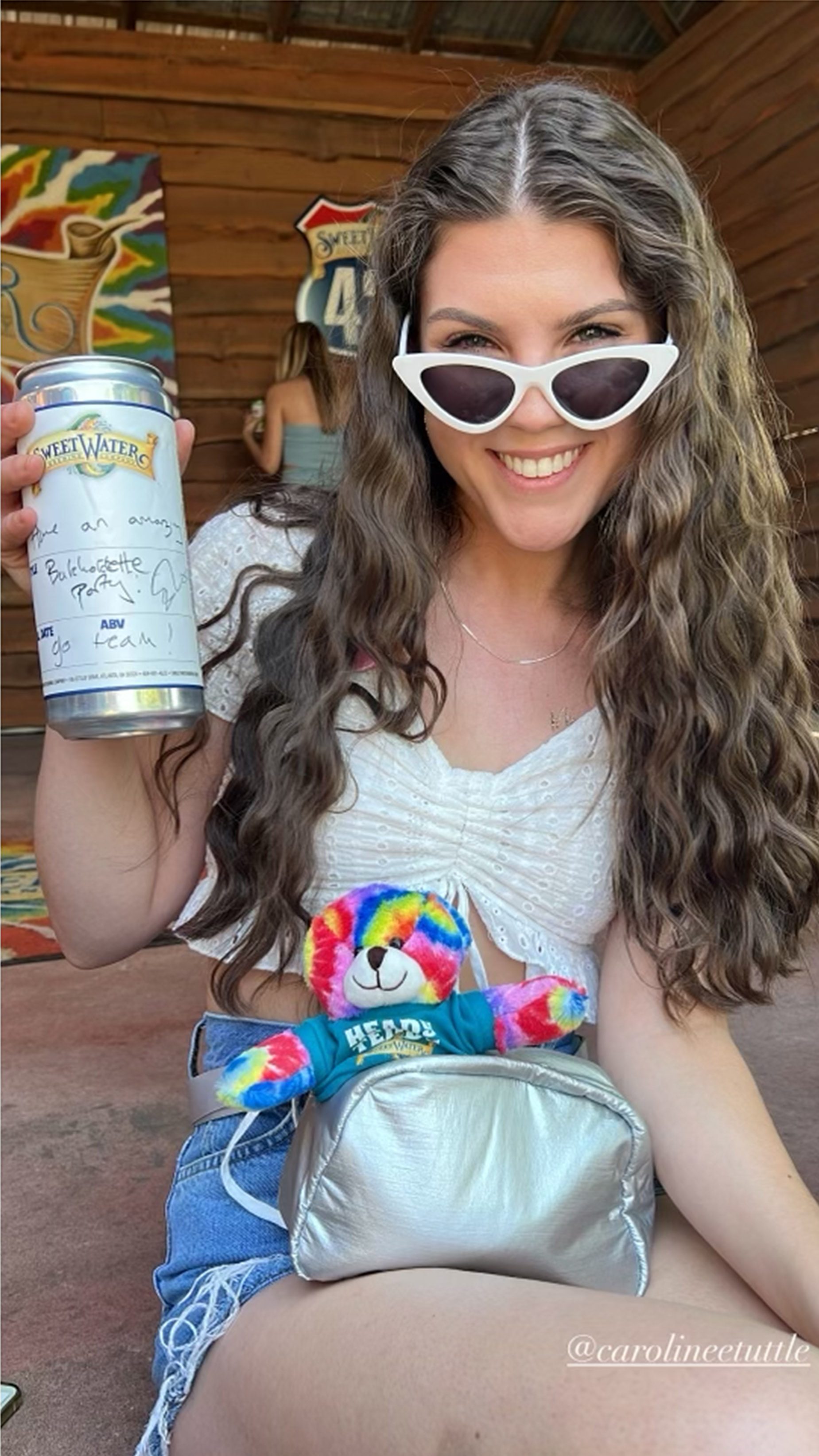 Caroline Tuttle with her beer canned signed by Ed Sheeran