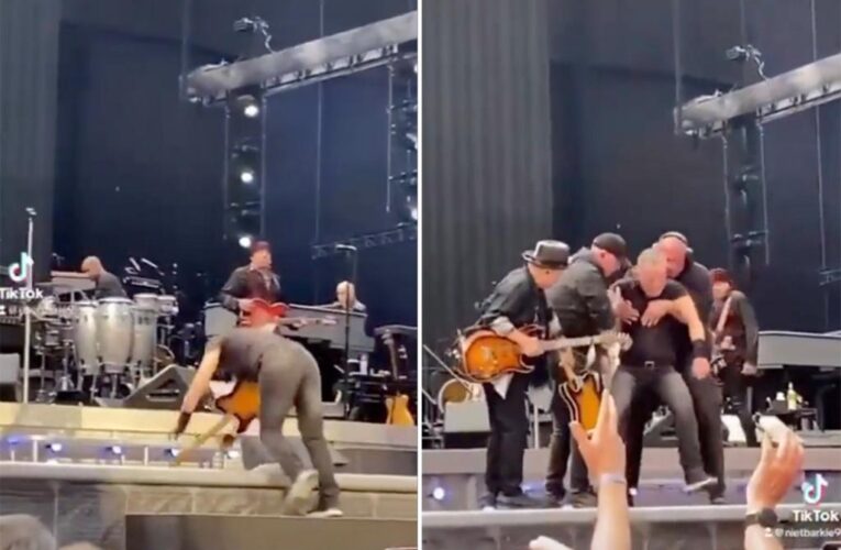 Bruce Springsteen falls on Amsterdam stage, band rush to help