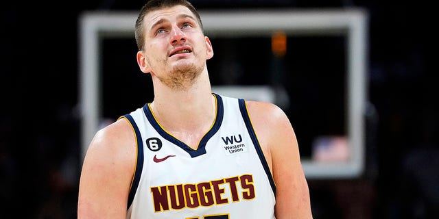 Nikola Jokic looks up