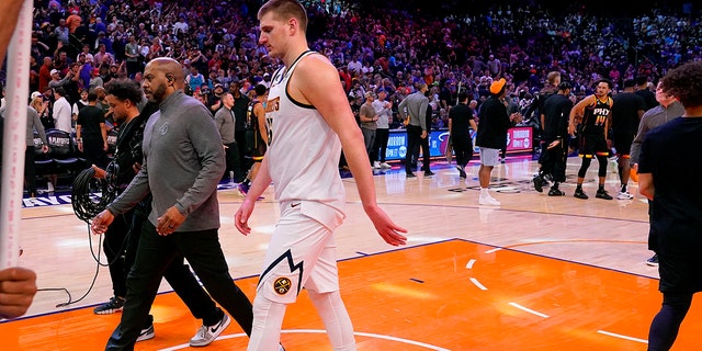 Nikola Jokic leaves the court