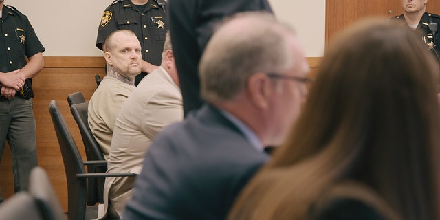 Michael Slager looking towards the camera while on trial