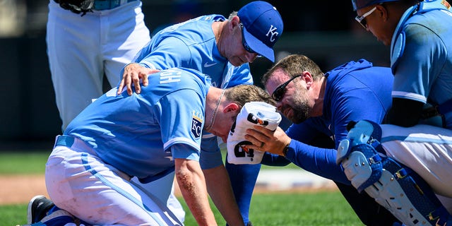 Ryan Yarbrough helped up