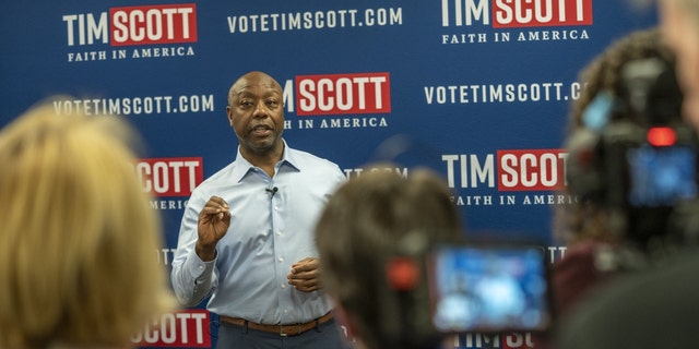 Senator Tim Scott speaks to reporters