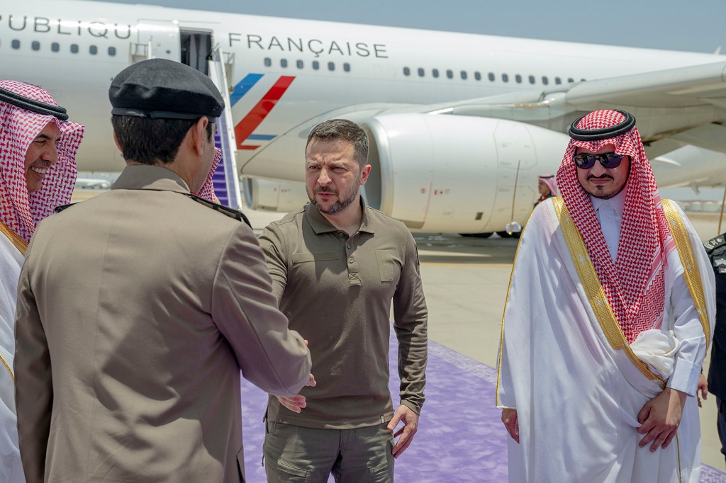 Zelenskyy, second right, is greeted by Prince Badr Bin Sultan, deputy governor of Mecca, right, upon his arrival at Jeddah airport, Saudi Arabia, Friday, May 19, 2023. Japan’s government officially announced Saturday that Zelenskyy is visiting Japan to join Group of Seven leaders in a session on Ukraine on Sunday.