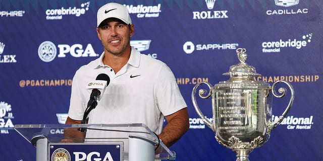 Brooks Koepka with the trophy