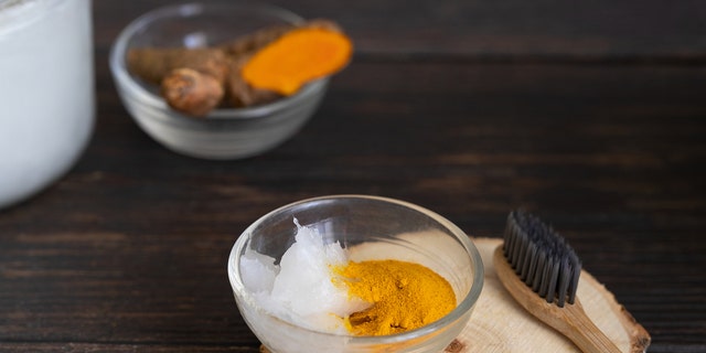 Brush teeth with turmeric