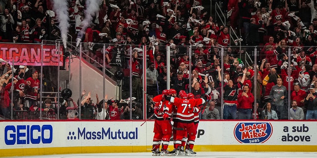 Hurricanes huddle after goal