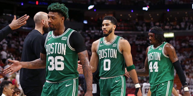 Marcus Smart, Jayson Tatum and Robert Williams III during game